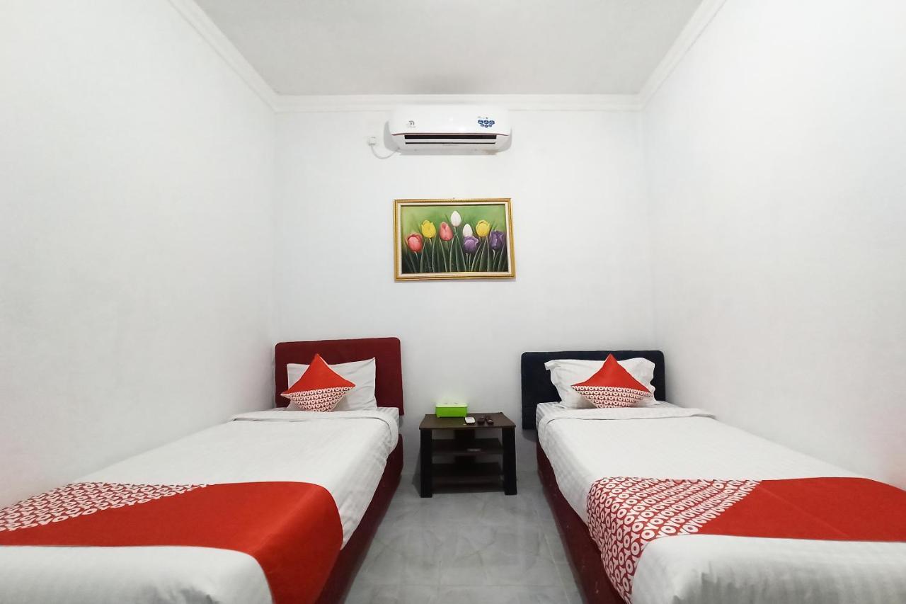 Oyo 2611 Hotel Krui Syariah מראה חיצוני תמונה